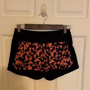 Reebok Women's Black and Pink Patterned Athletic Shorts